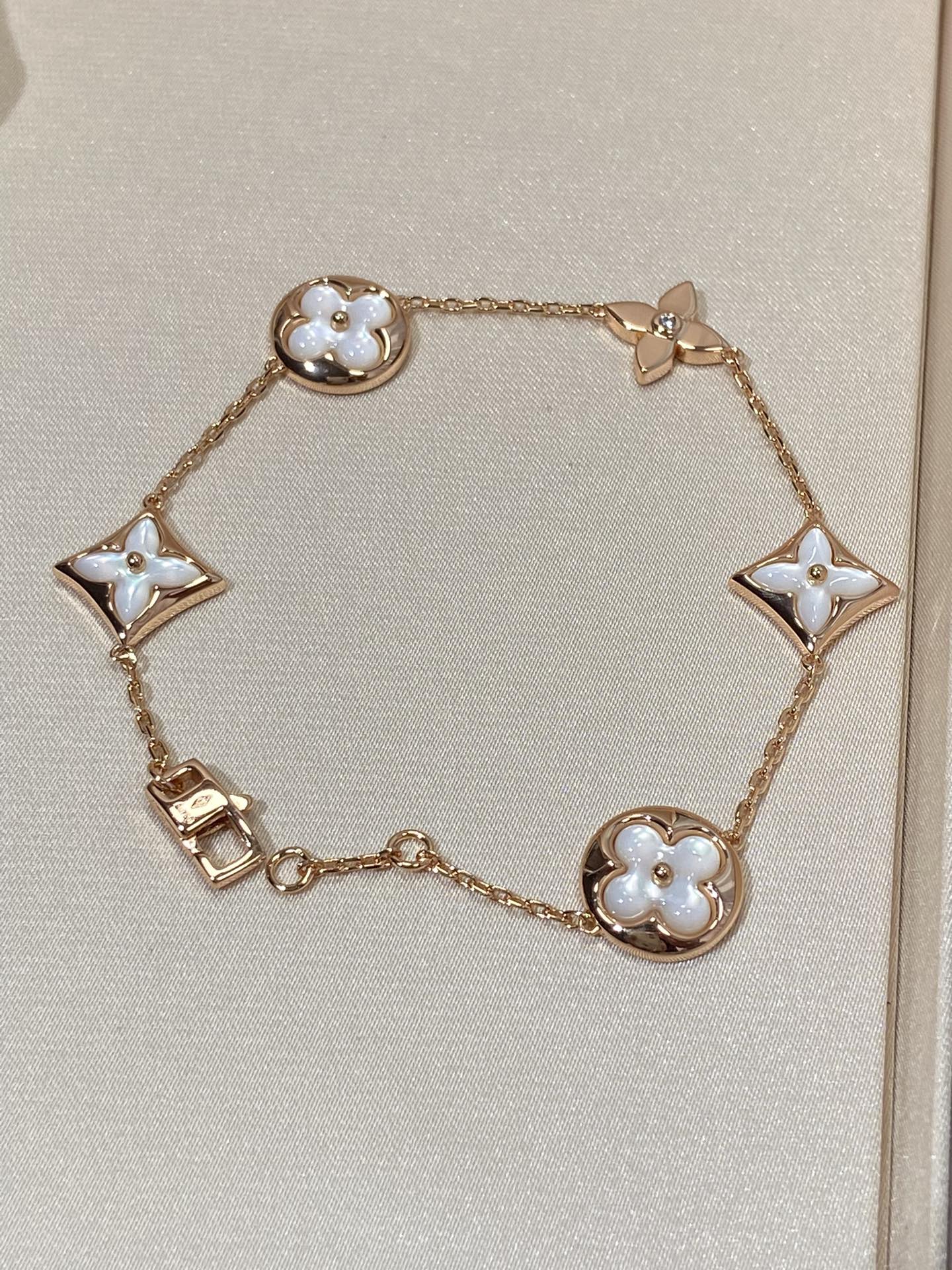 [Polaidi Jewelry]STAR AND SUN 5 MOTIF MOP PINK GOLD BRACELET