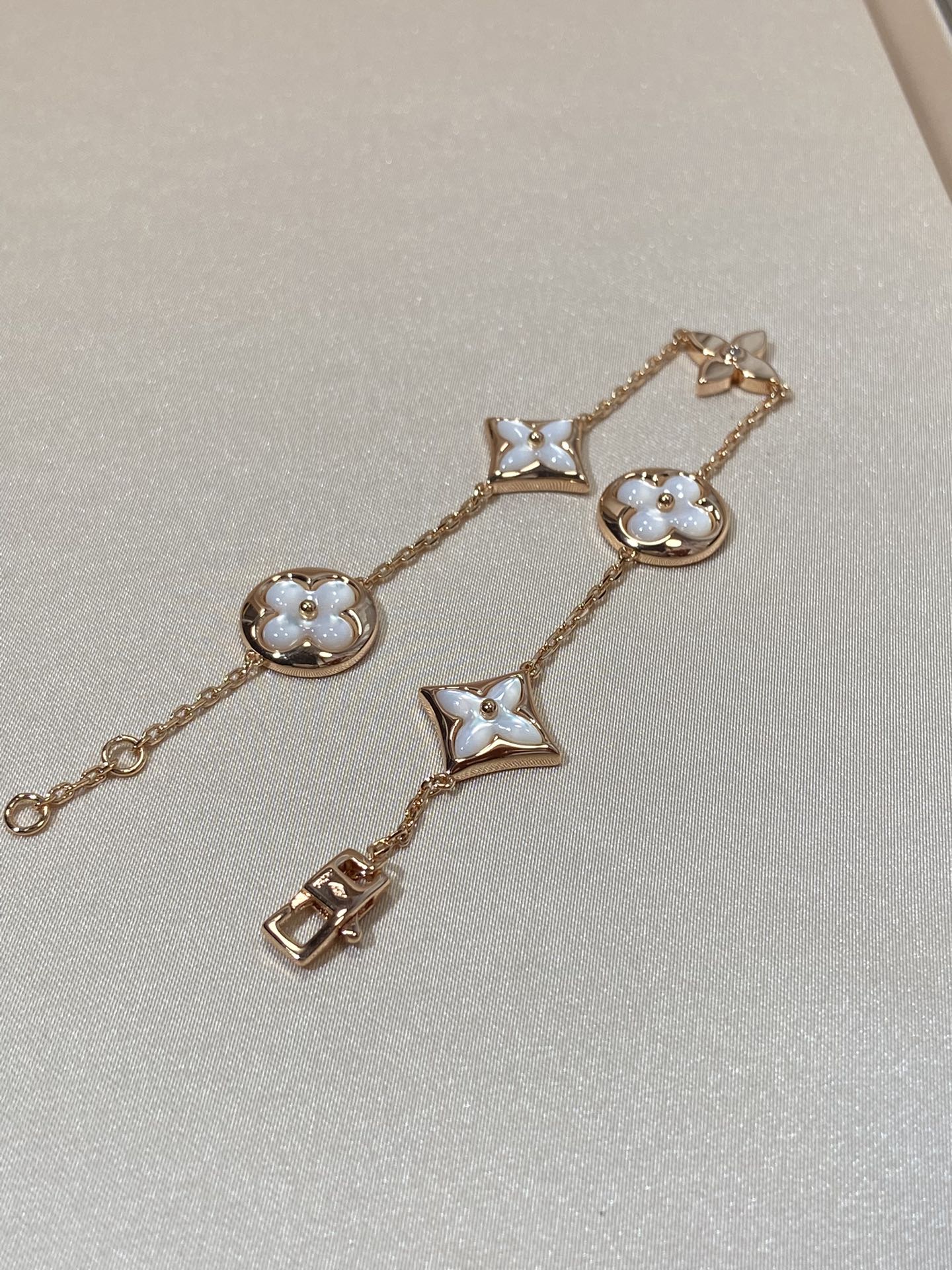 [Polaidi Jewelry]STAR AND SUN 5 MOTIF MOP PINK GOLD BRACELET