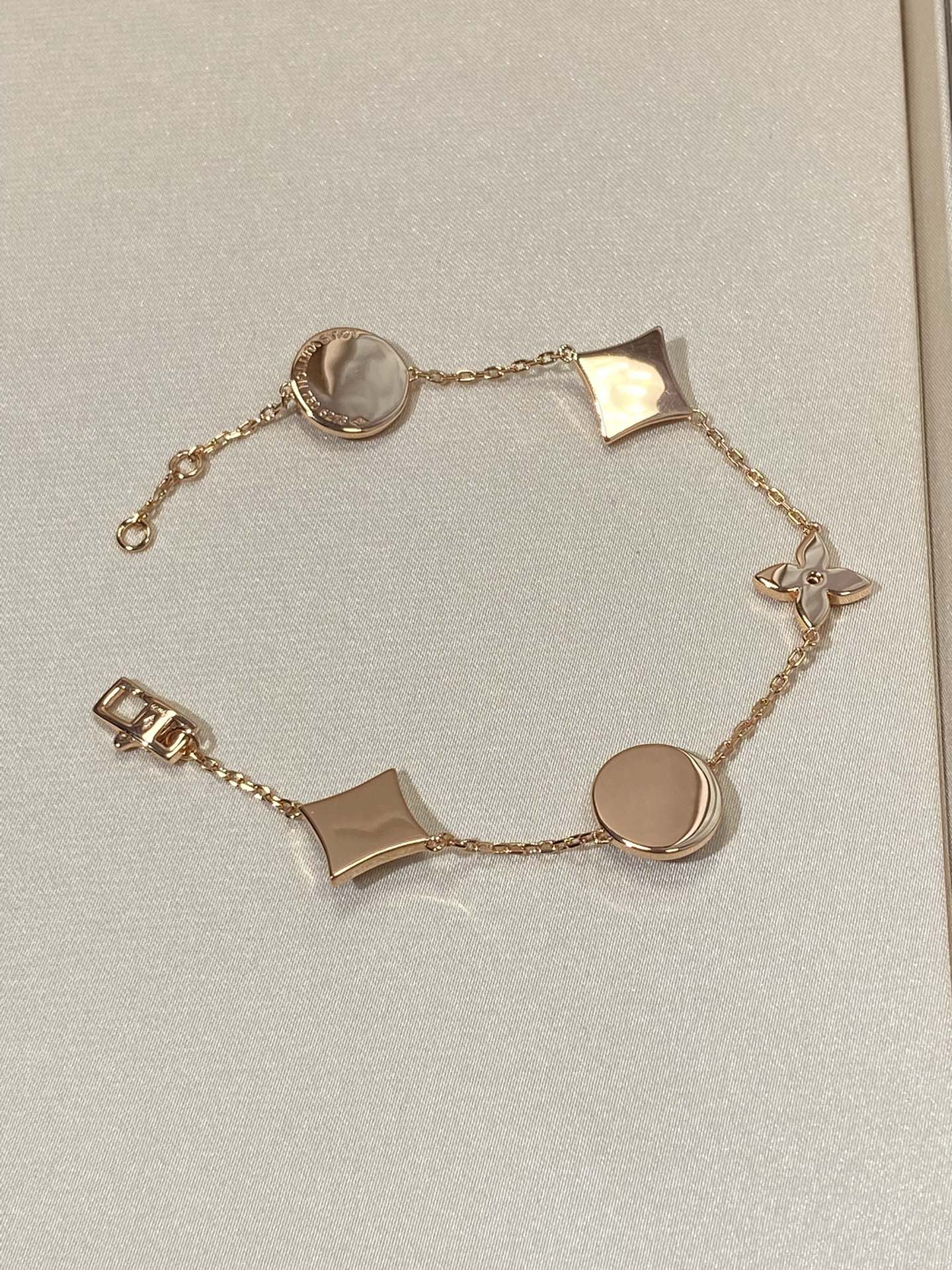 [Polaidi Jewelry]STAR AND SUN 5 MOTIF MOP PINK GOLD BRACELET