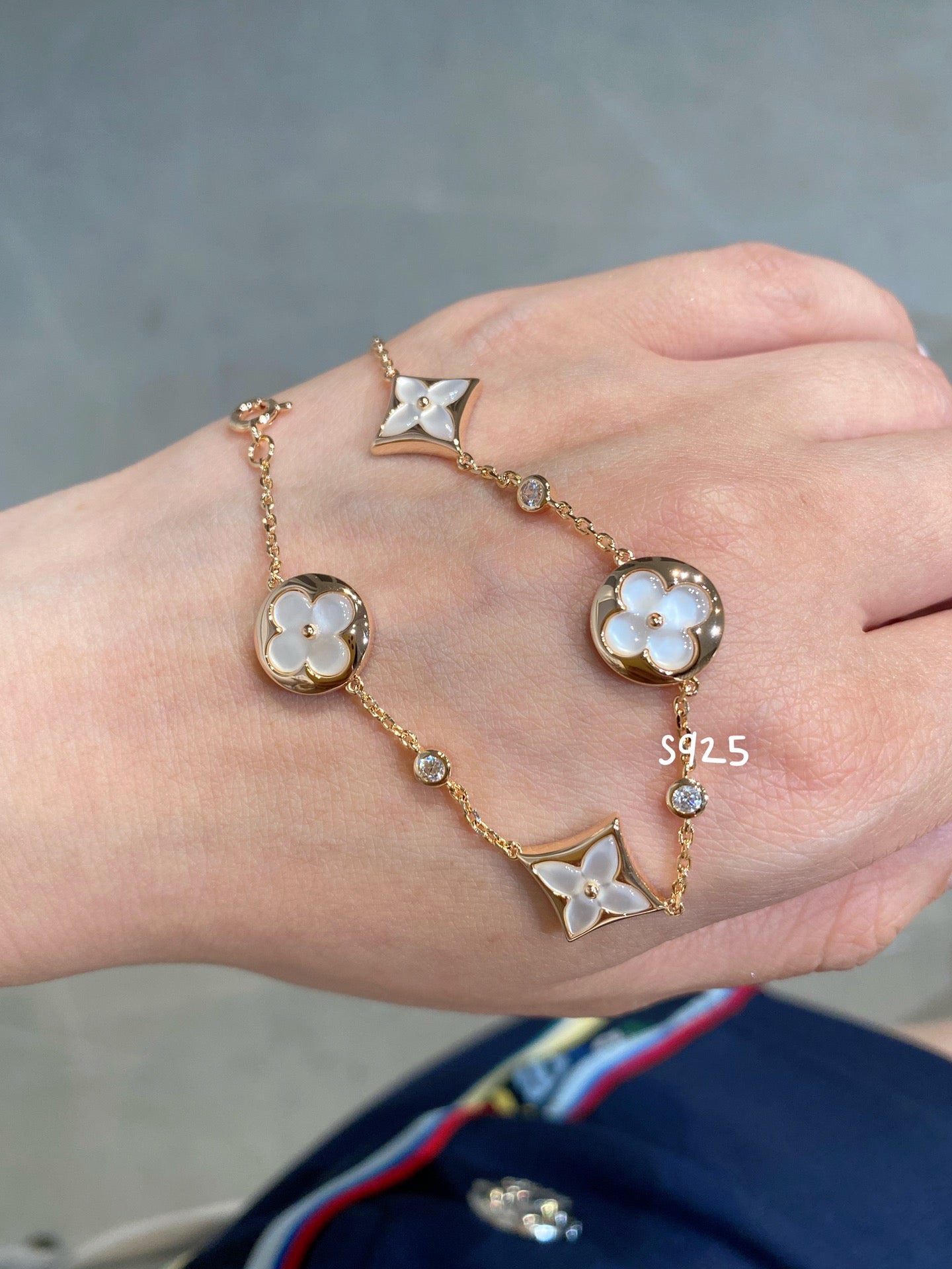 [Polaidi Jewelry]STAR AND SUN 4 MOTIF WHITE MOP PINK GOLD BRACELET