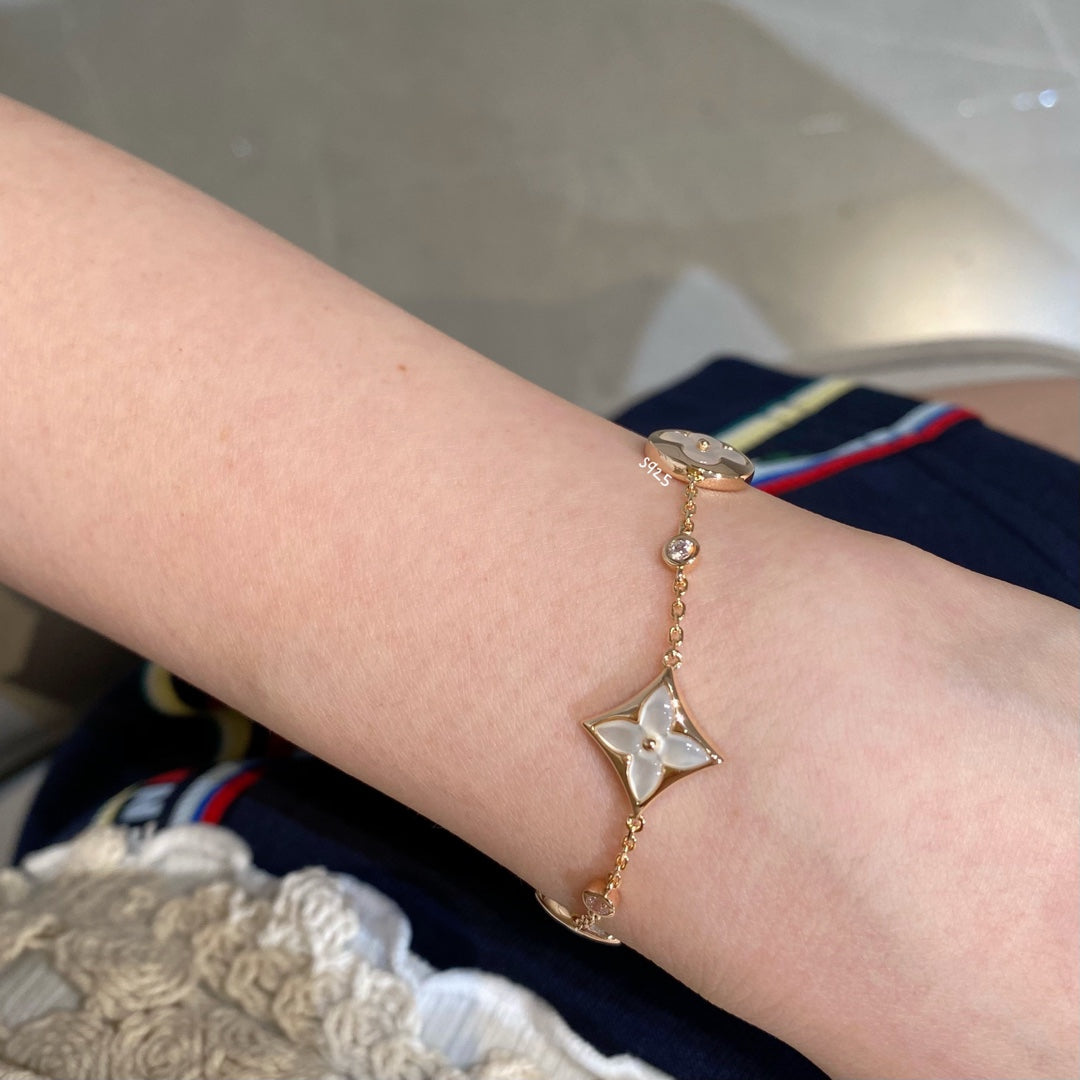 [：Polaidi Jewelry]STAR AND SUN 4 MOTIF WHITE MOP PINK GOLD BRACELET